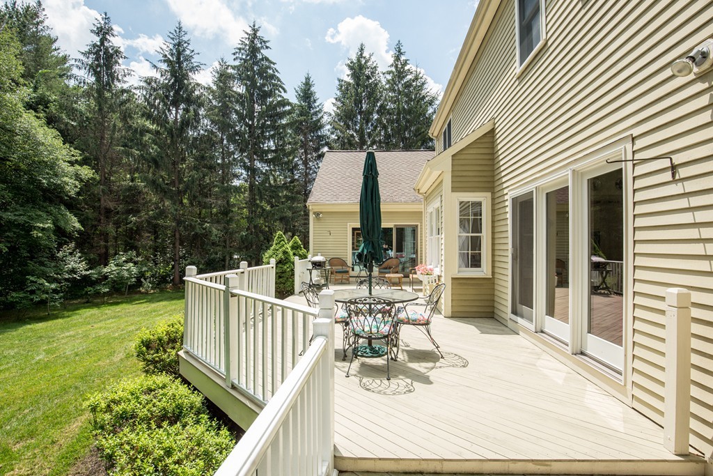 12 Dana Road Boxford, MA 01921 - Photo 23 of 26 a view of a house with backyard and sitting area