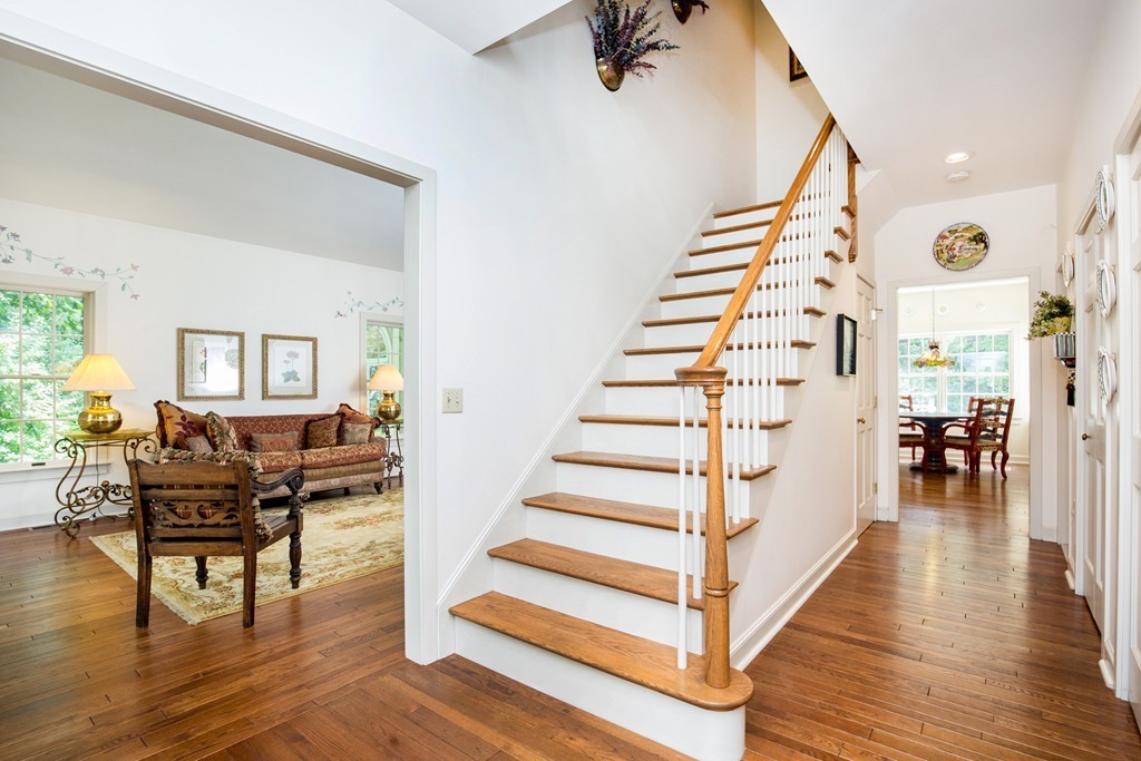 12 Dana Road Boxford, MA 01921 - Photo 3 of 26 a view of entryway and hall with wooden floor