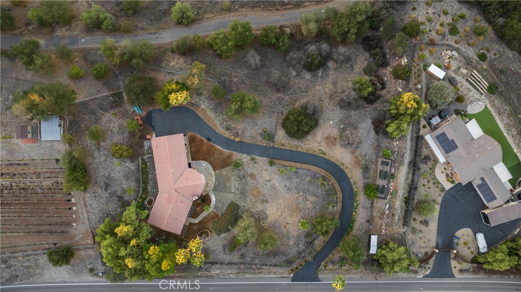 32336 Cole Grade Road Valley Center, CA 92082 - Photo 27 of 28 an aerial view of a house with a yard and lake view
