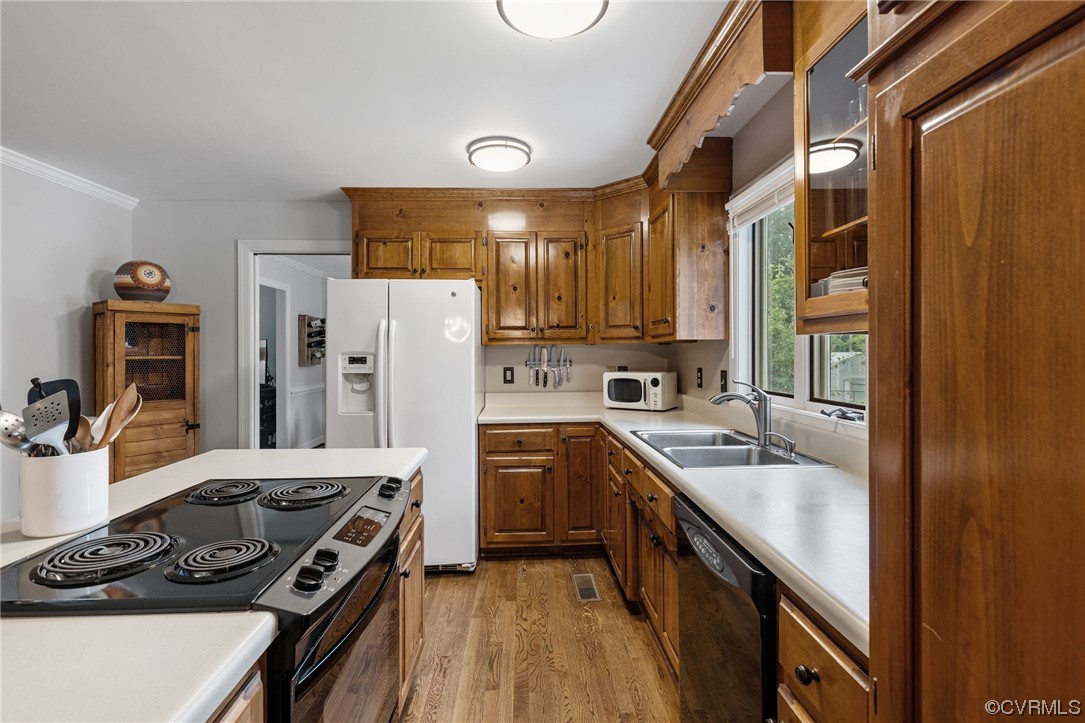 19850 Templeton Road Carson, VA 23830 - Photo 20 of 49 a kitchen with a stove a sink and a refrigerator