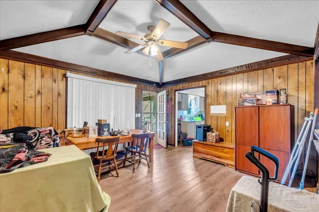 a kitchen with a sink a cabinets and window
