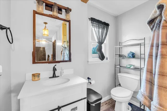 a view of flower garden in front of house