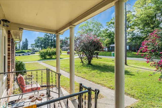 a view of a porch with a yard