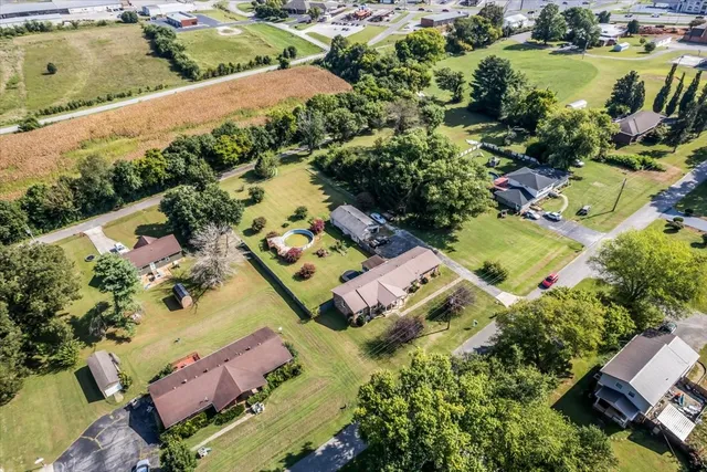 an aerial view of residential house with outdoor space