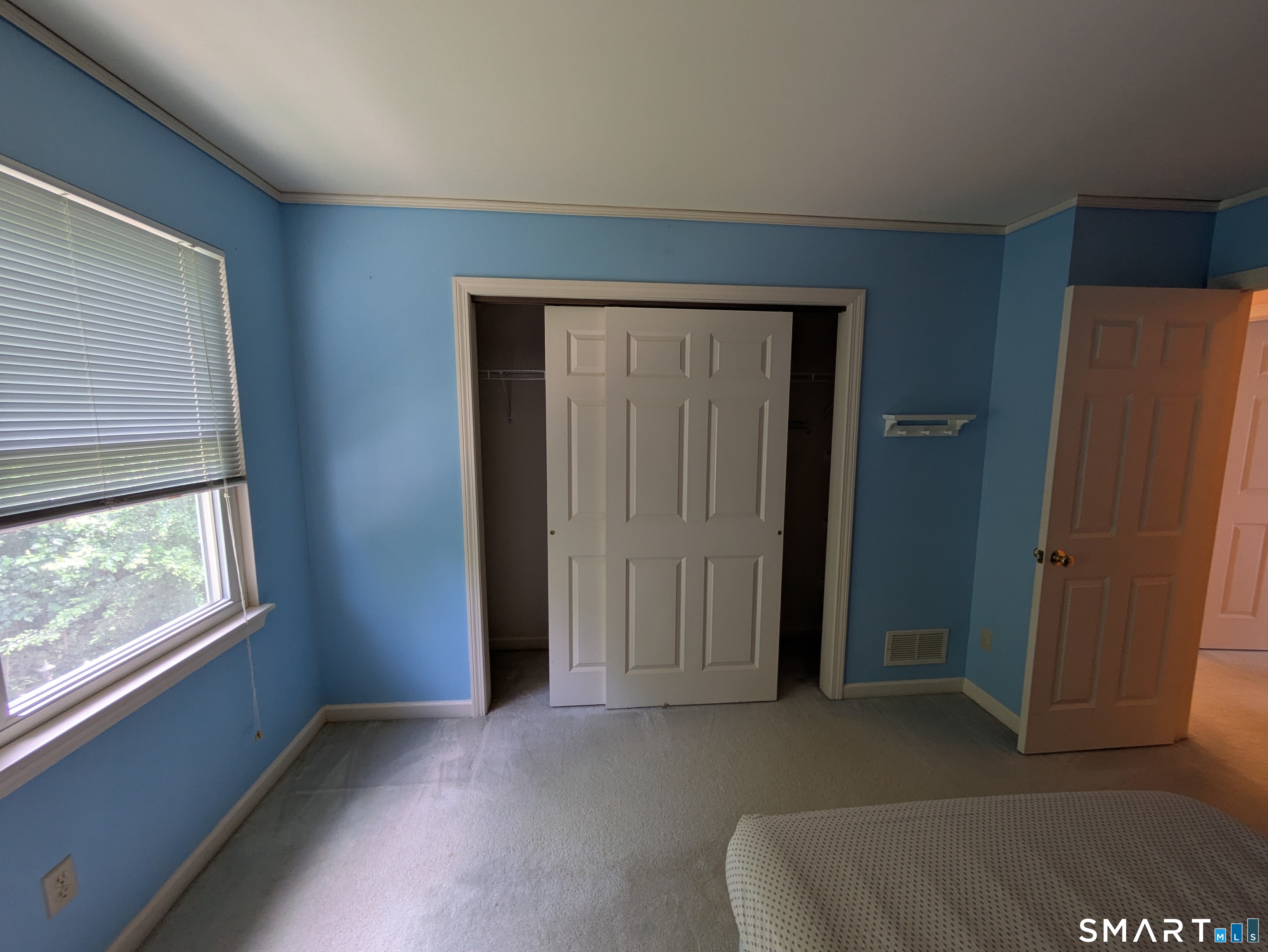 61 Basking Brook Road Shelton, CT 06484 - Photo 23 of 25 an empty room with windows and closet