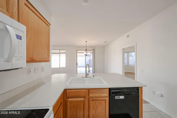 a view of a kitchen cabinets and wooden floor