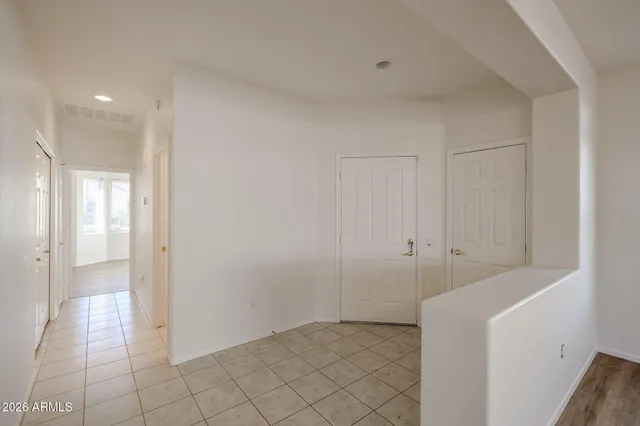 a view of storage and utility room with washer and dryer
