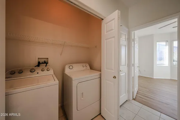 a utility room with dryer and washer