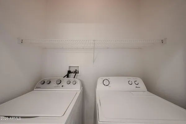 a view of a bathroom with mirror