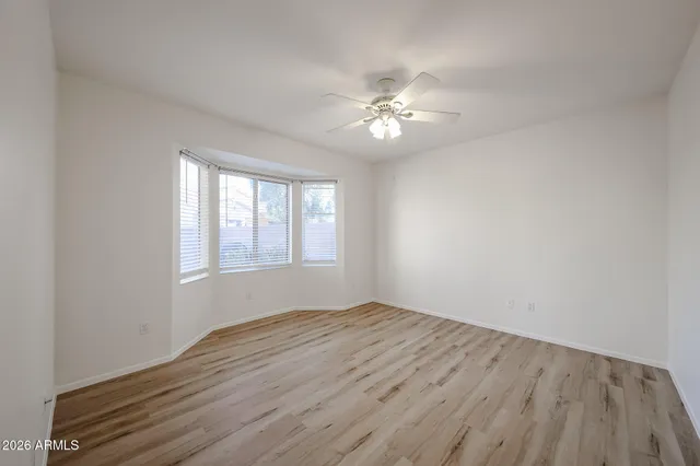 a bathroom with a double vanity sink and mirror