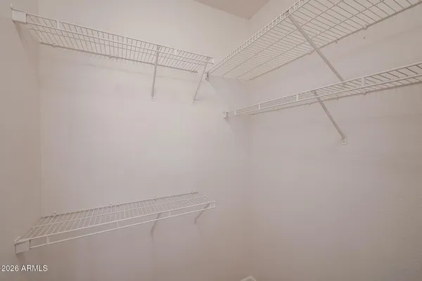 a view of a room with racks on the wall