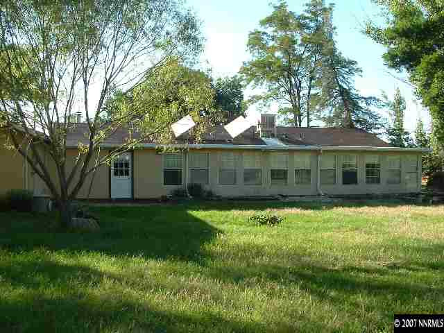 1455 Rice Road Fallon, NV 89406 - Photo 2 of 3 a front view of a house with a yard