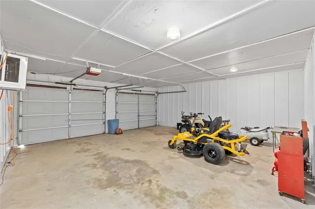 a utility room with sink dryer and washer