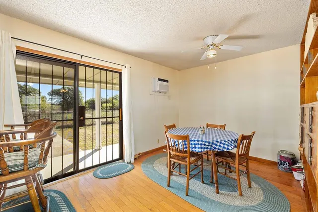 a bed room with furniture and a window