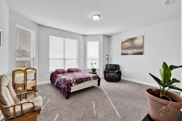 a kitchen with a stove and a cabinets