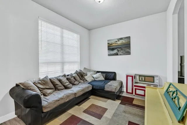 a living room with furniture and a couch