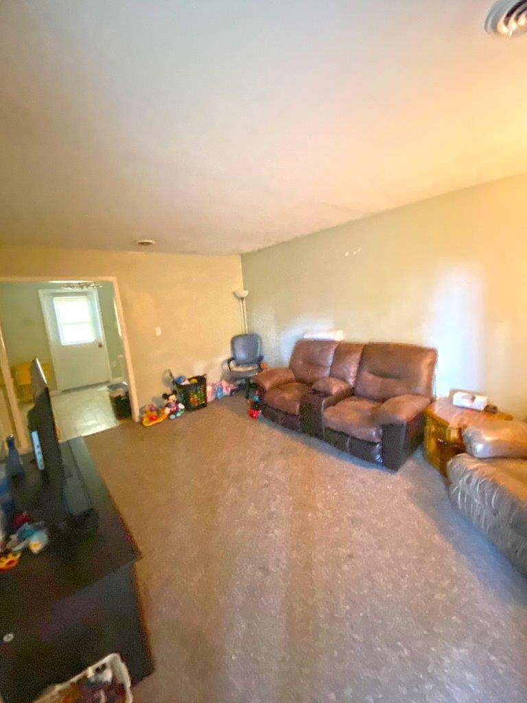 1485 Bandy Mill Road Hardy, VA 24101 - Photo 14 of 14 a living room with furniture and a flat screen tv