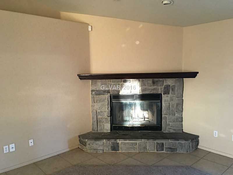 5800 Grain Mill Road Pahrump, NV 89061 - Photo 2 of 10 Property Photo. wood fireplace