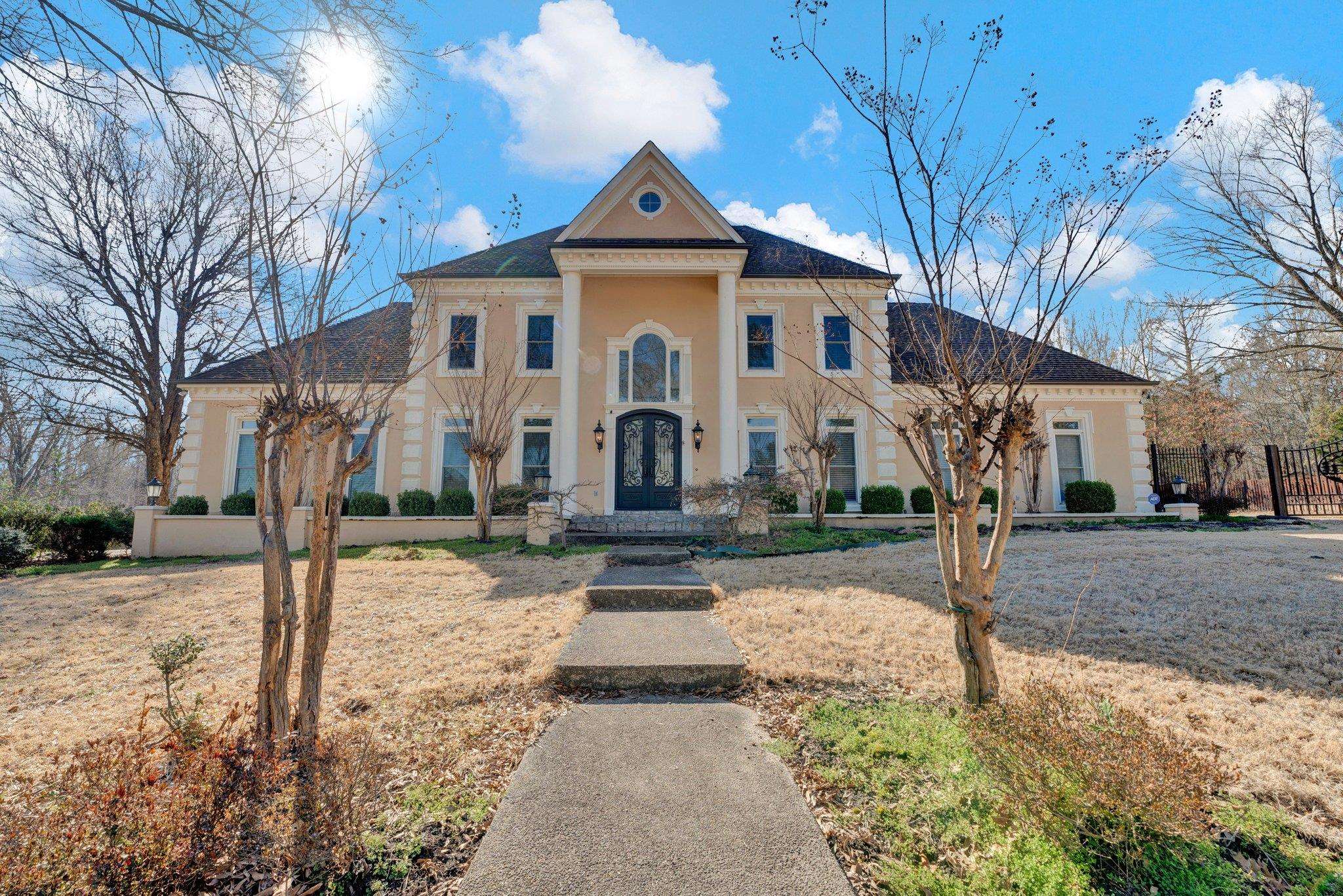 47 Summer Grove Road Memphis, TN 38018 - Photo 1 of 35 Greek revival inspired property with french doors and stucco siding