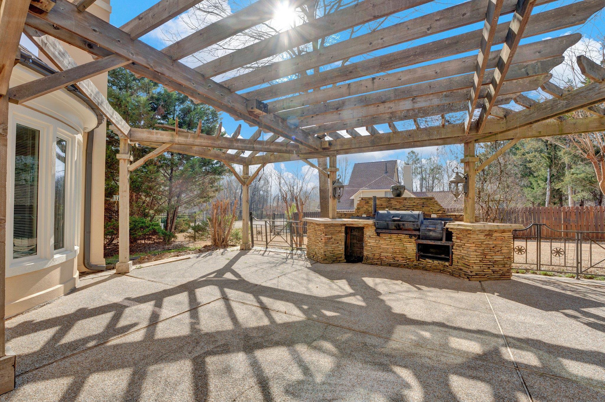 47 Summer Grove Road Memphis, TN 38018 - Photo 31 of 35 View of patio / terrace with area for grilling, fence, and a pergola