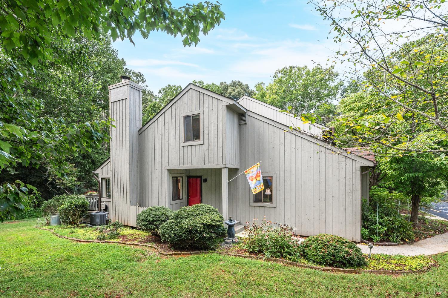 174 Sunset Ridge Road Forest, VA 24551 - Photo 1 of 43 a view of a house with backyard and garden