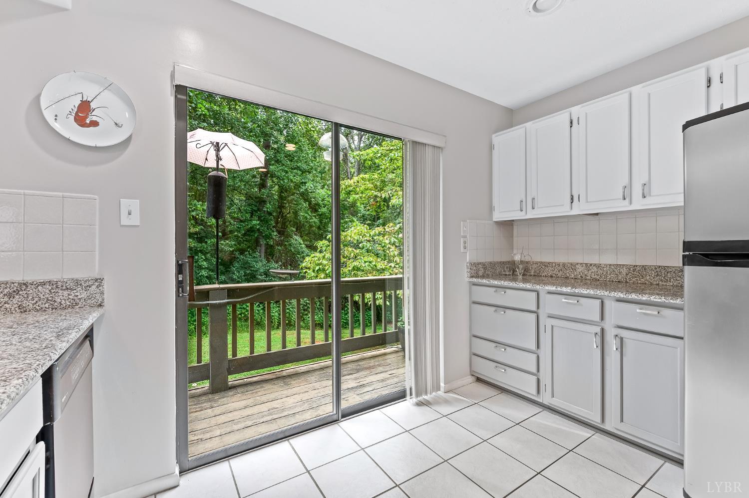 174 Sunset Ridge Road Forest, VA 24551 - Photo 11 of 43 a kitchen with a sink and a window