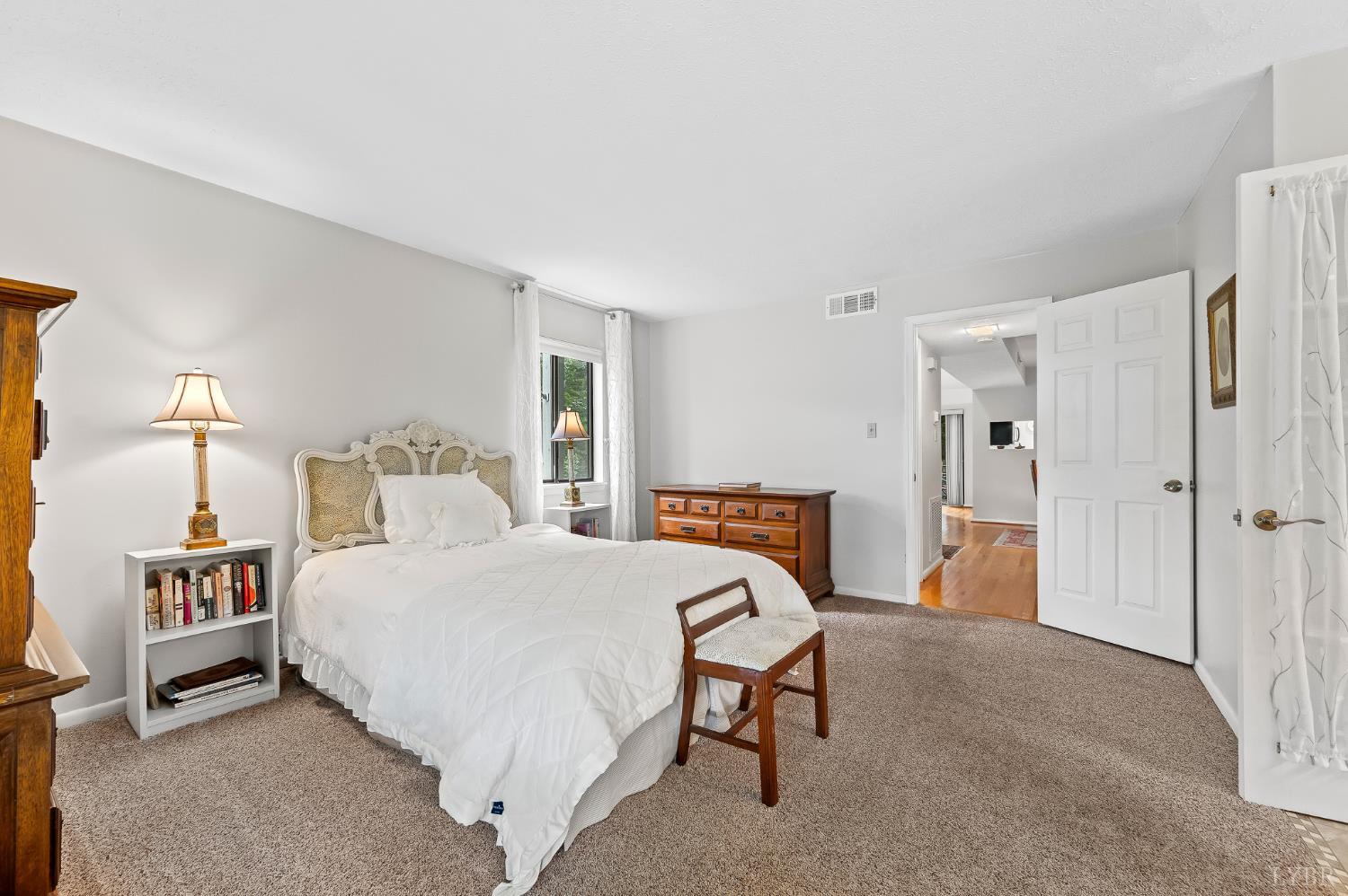 174 Sunset Ridge Road Forest, VA 24551 - Photo 16 of 43 a bedroom with a bed and a table