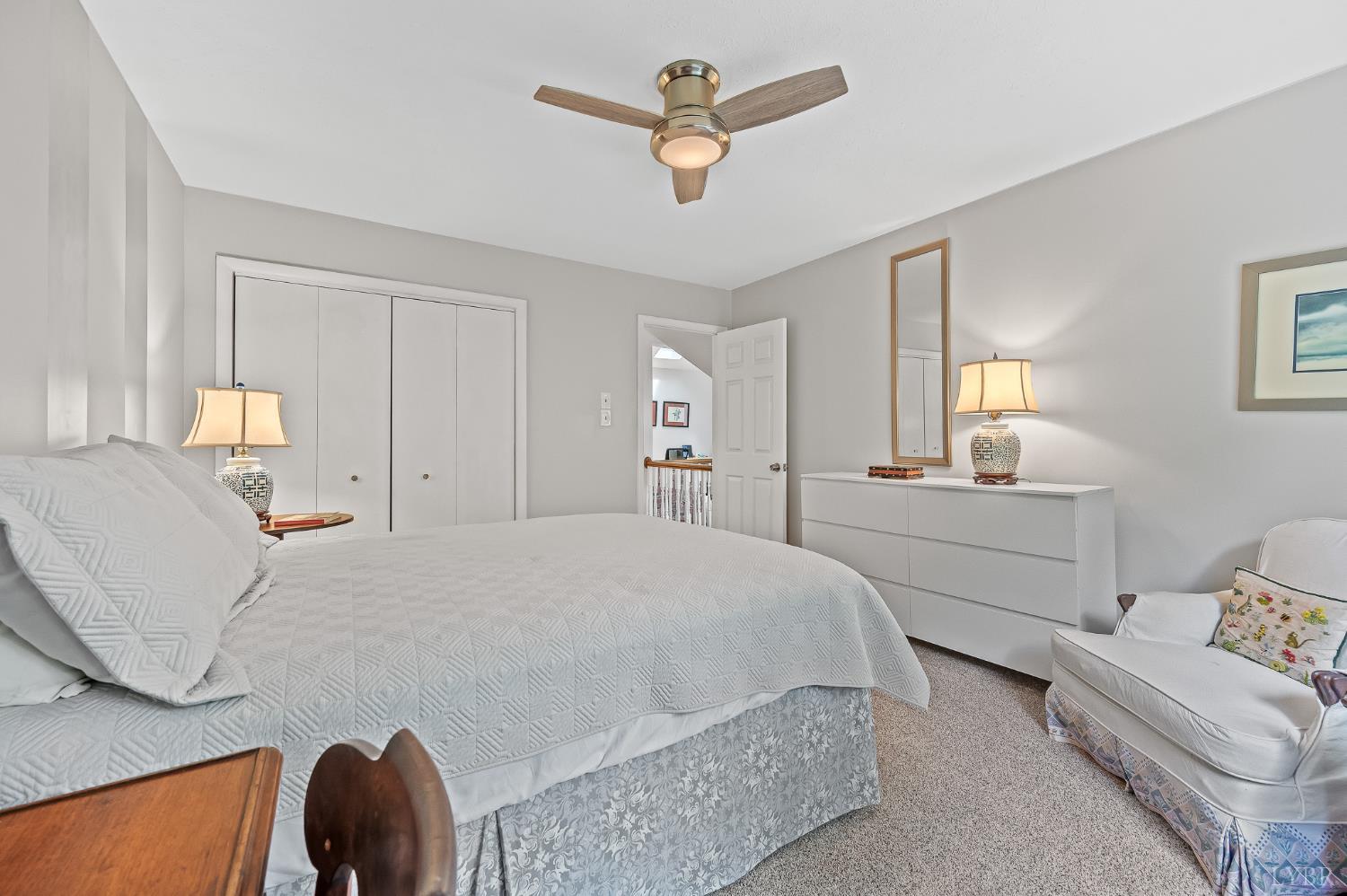 174 Sunset Ridge Road Forest, VA 24551 - Photo 28 of 43 a bedroom with a bed and a chandelier