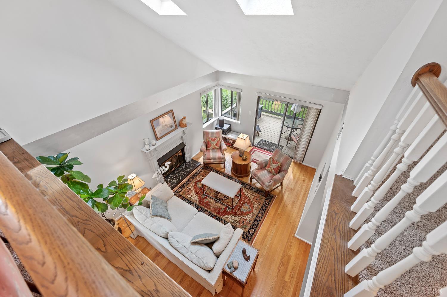 174 Sunset Ridge Road Forest, VA 24551 - Photo 29 of 43 a living room with furniture and a wooden floor