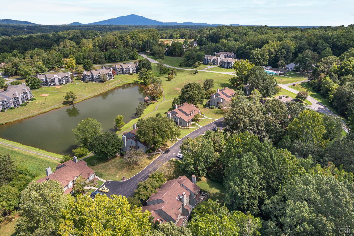 174 Sunset Ridge Road Forest, VA 24551 - Photo 39 of 43 an aerial view of lake residential houses with outdoor space and lake view
