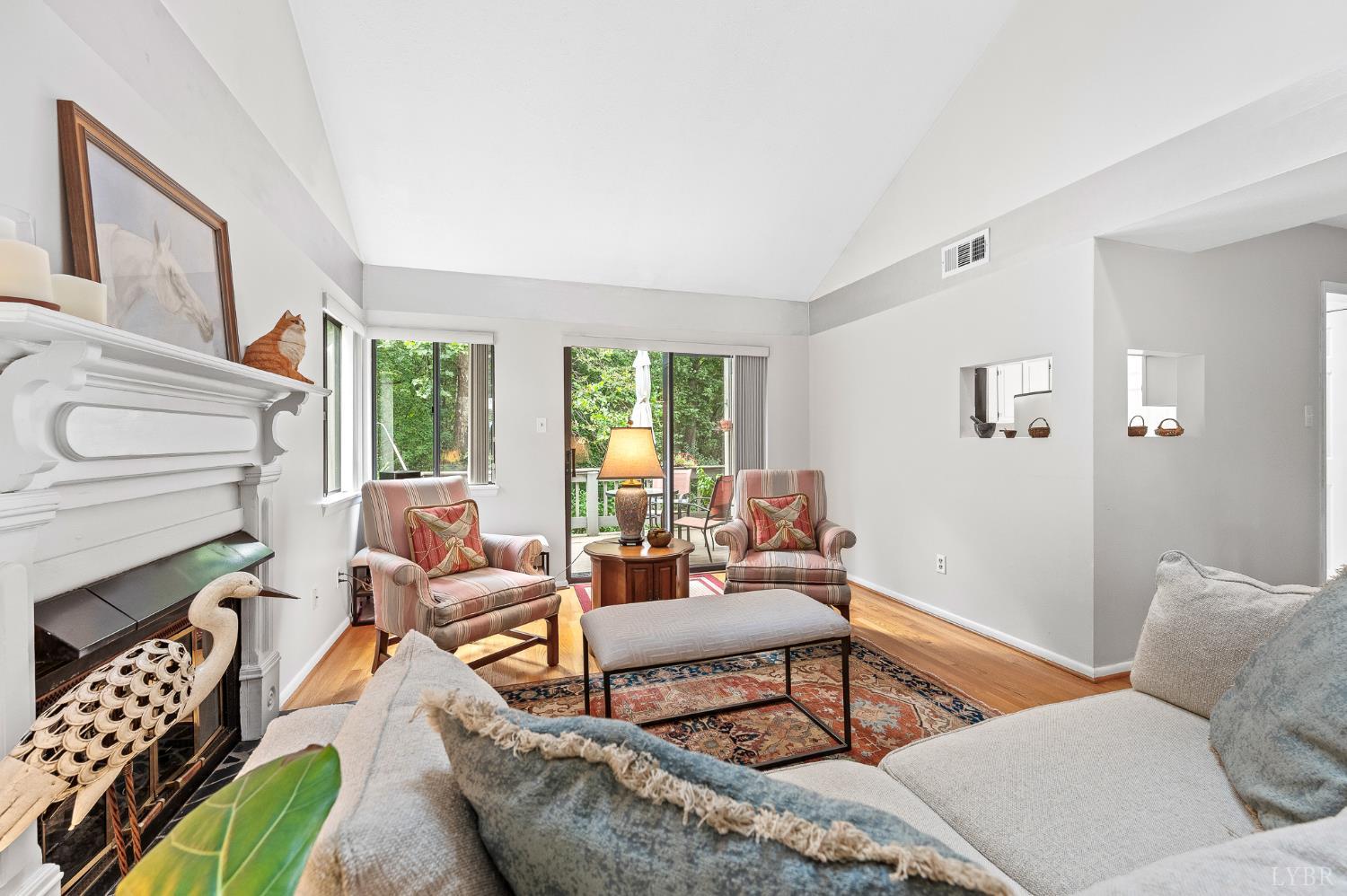 174 Sunset Ridge Road Forest, VA 24551 - Photo 5 of 43 a living room with furniture and a fireplace