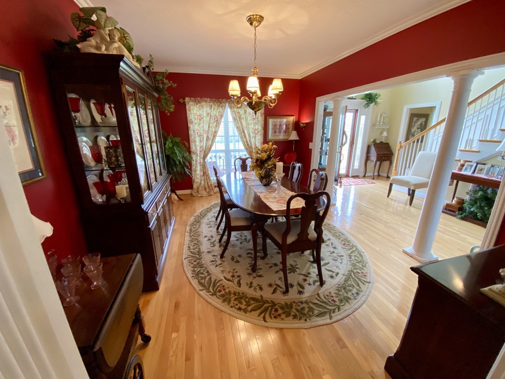 439 Ranch Road Portland, TN 37148 - Photo 12 of 49 a living room with furniture and a chandelier