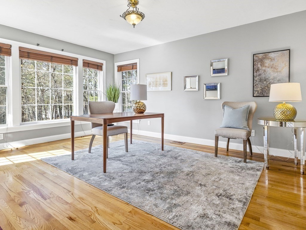 23 Vesta Road Natick, MA 01760 - Photo 14 of 30 a work room with furniture and a wooden floor