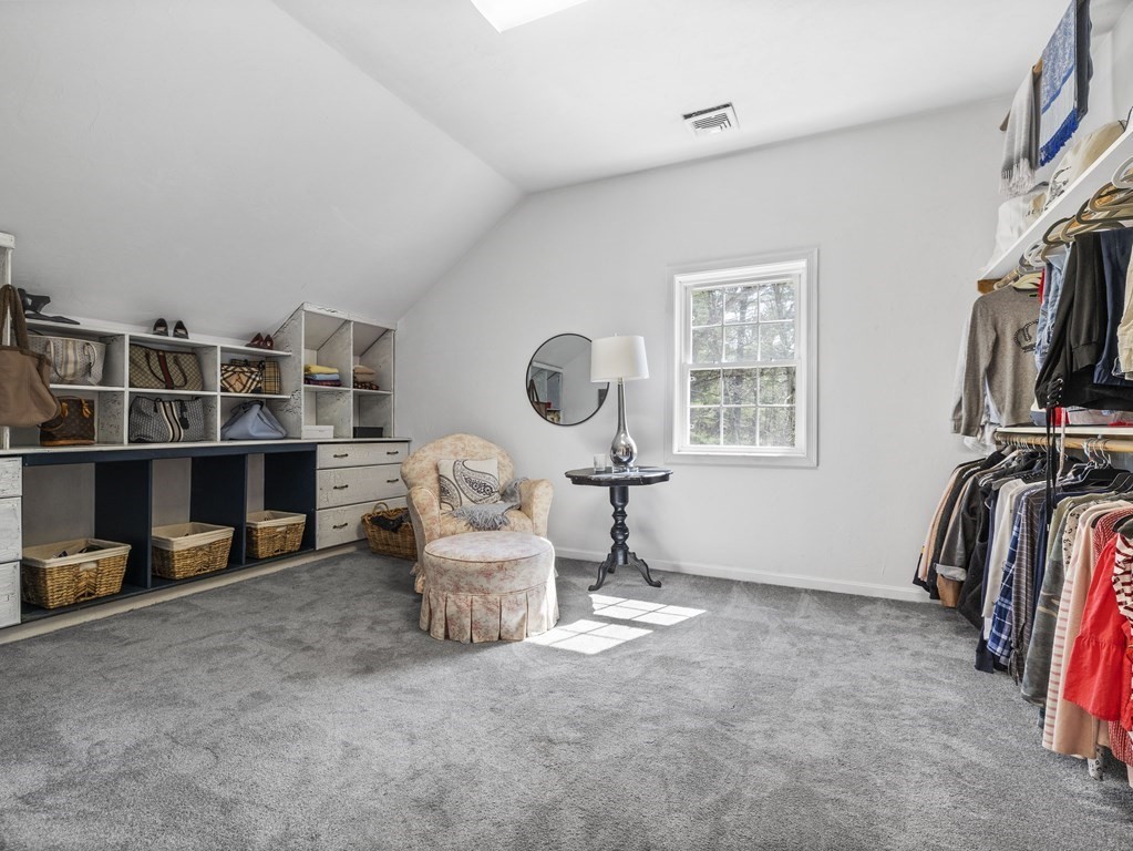23 Vesta Road Natick, MA 01760 - Photo 20 of 30 a living room with furniture a window and a flat screen tv