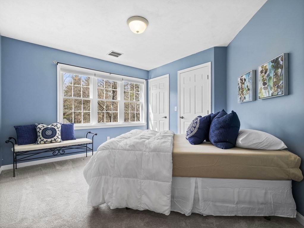 23 Vesta Road Natick, MA 01760 - Photo 21 of 30 a bedroom with a bed and a window