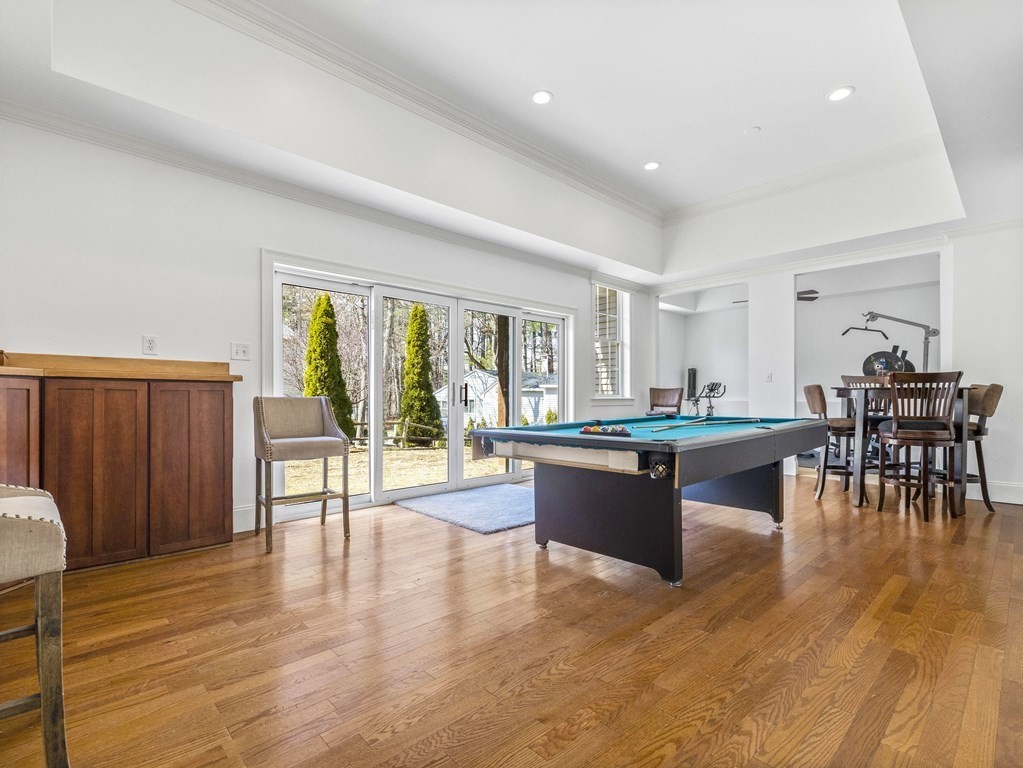 23 Vesta Road Natick, MA 01760 - Photo 25 of 30 a living room with furniture and a table