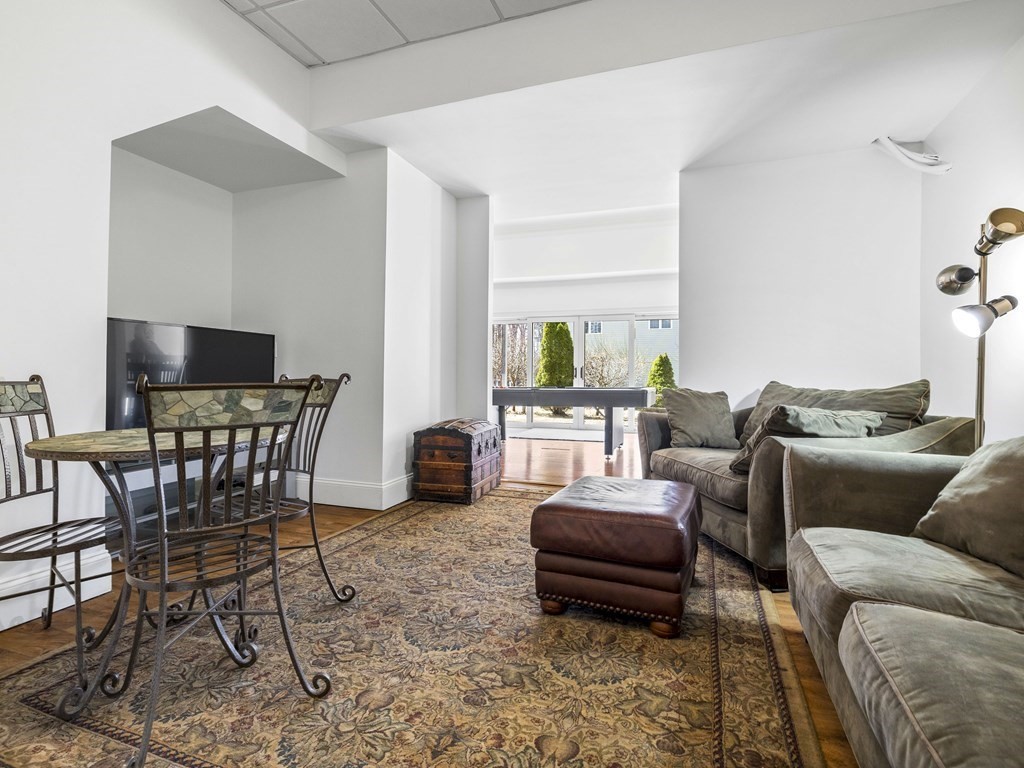 23 Vesta Road Natick, MA 01760 - Photo 26 of 30 a living room with furniture and a large window