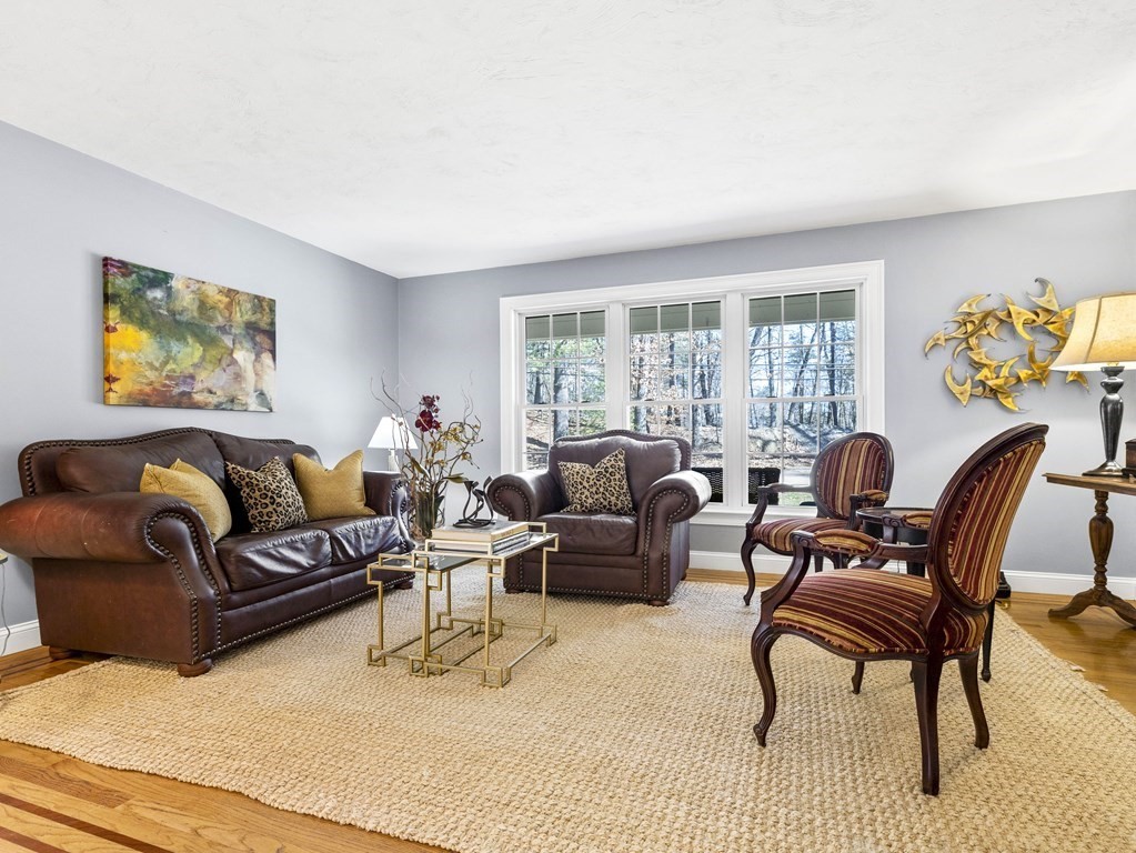 23 Vesta Road Natick, MA 01760 - Photo 4 of 30 a living room with furniture lamp and a potted plant