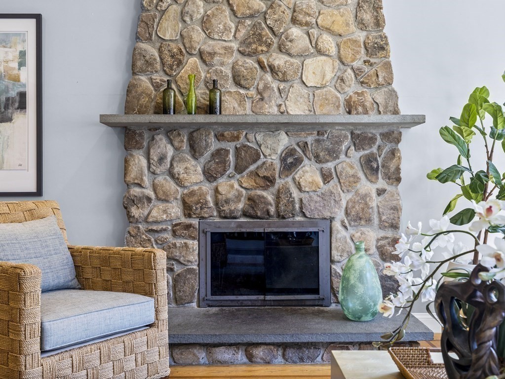 23 Vesta Road Natick, MA 01760 - Photo 10 of 30 a living room with a fireplace