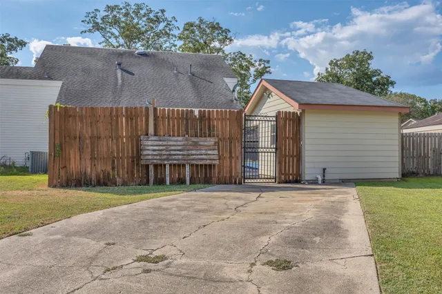 front view of a house with a garden