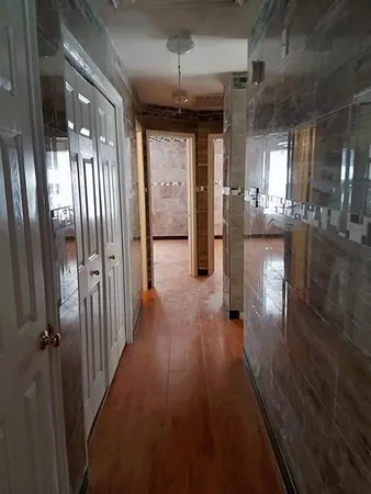 a view of a window in an empty room