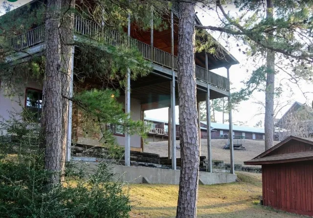 a backyard of a house with lots of green space