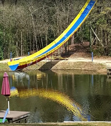 a view of a lake with a swimming pool