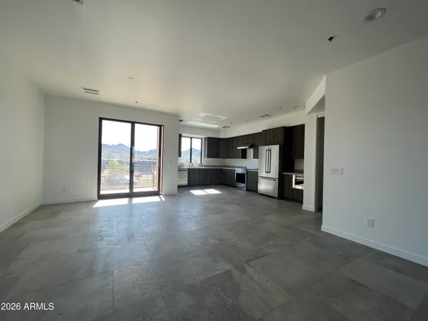 a view of livingroom with furniture and window