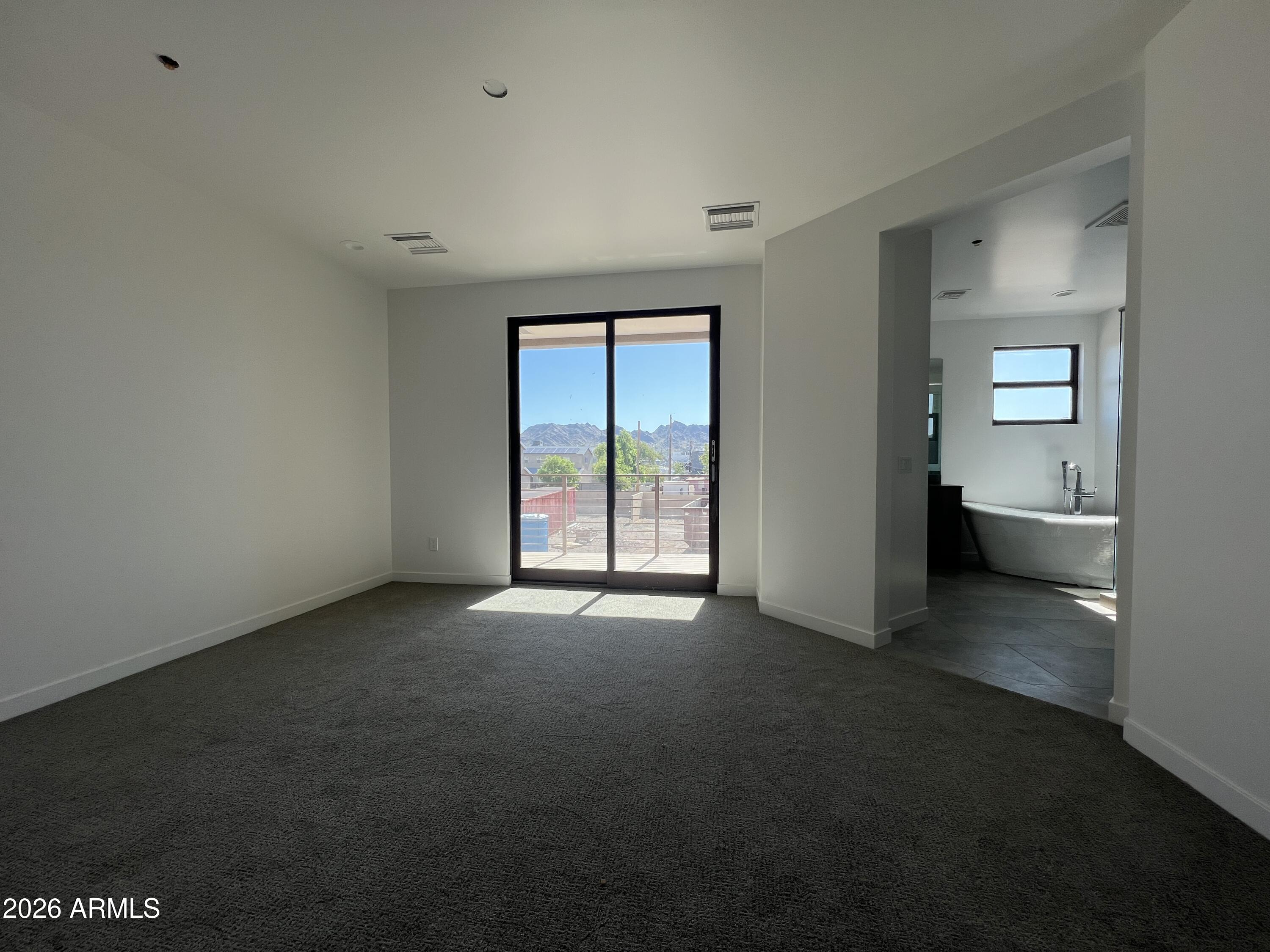 505 East Mountain View Road Phoenix, AZ 85020 - Photo 6 of 18 a view of empty room with window