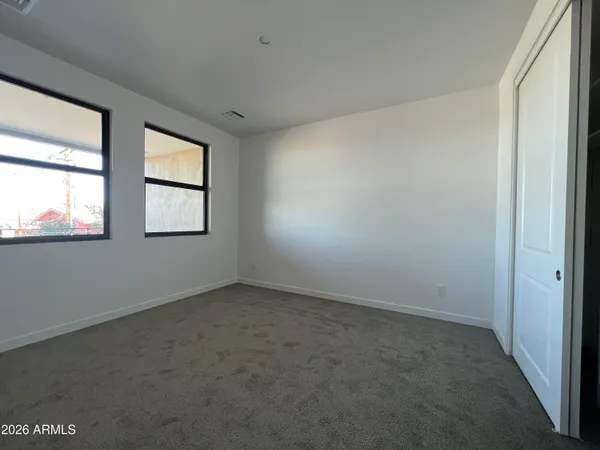 an empty room with windows