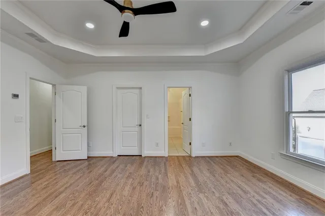 a kitchen with stainless steel appliances granite countertop a sink and a refrigerator
