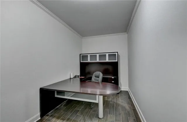 a spacious bathroom with a double vanity sink a mirror and a bathtub