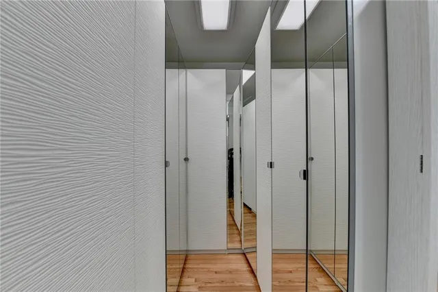 a view of empty room with a fireplace