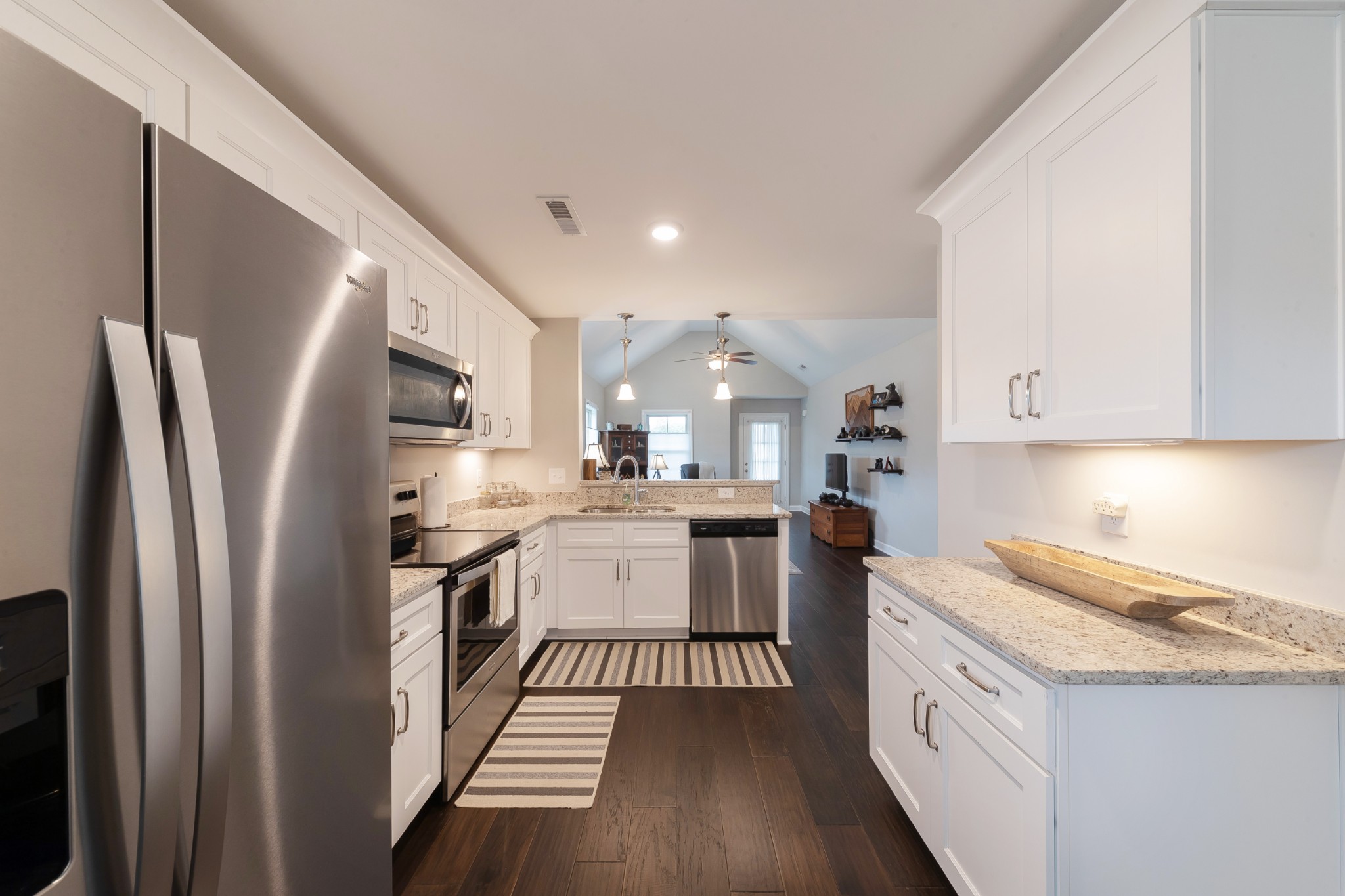 191 Preserve Circle Manchester, TN 37355 - Photo 11 of 25 a kitchen with a sink stainless steel appliances and cabinets